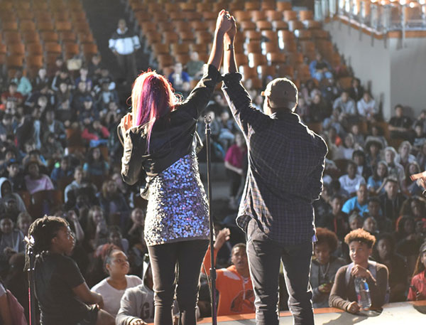 Students from Woodrow Wilson High School shared the stage with local artists like Sylver Logan Sharp (left)*