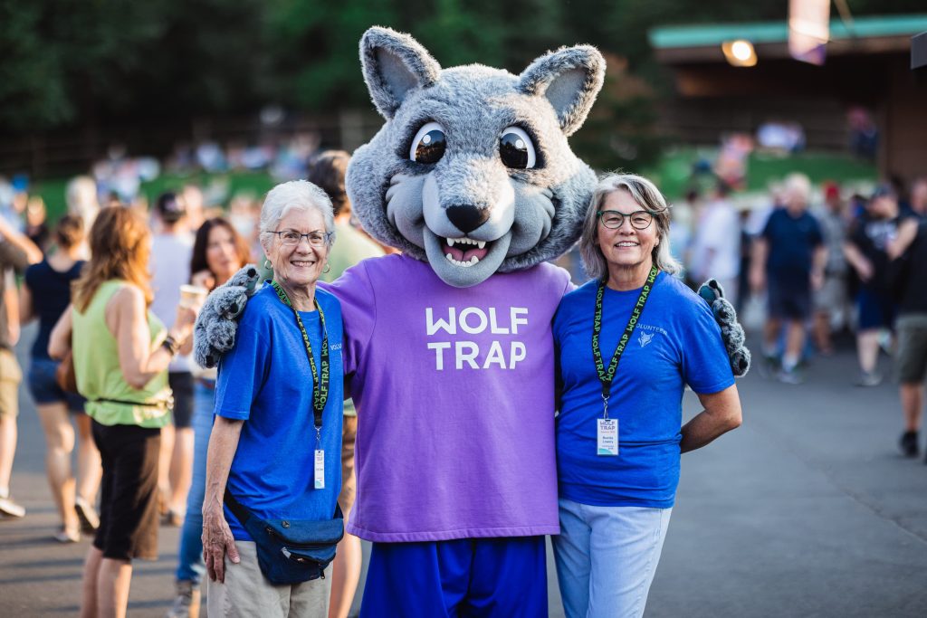 Wolfie with volunteers.