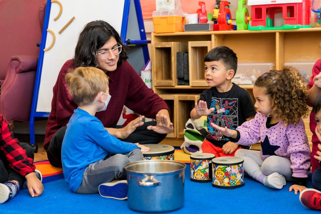 Teaching Artist with students. 